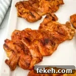 Fresh Chicken Recipes for Summer Grilling and Light Meals 8 Smoked chicken thighs on a platter.
