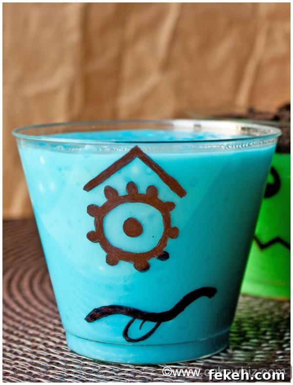 Halloween Pudding Cups: Spooky Dessert Cups for Party Treats 4 Monster Pudding Cups on Brown Background