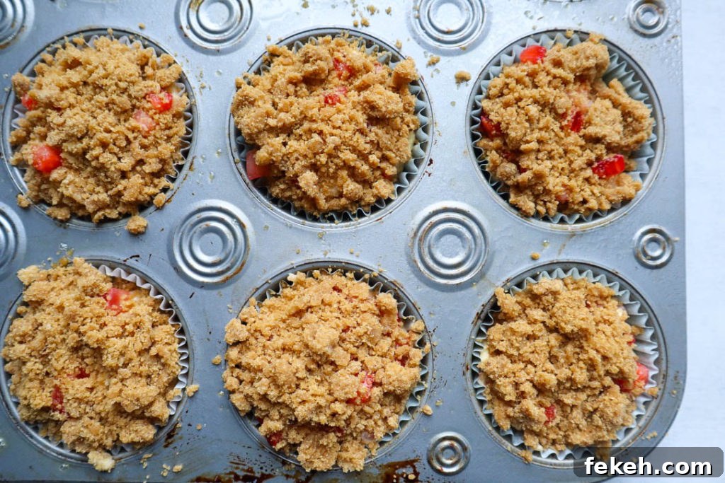 Strawberry Coconut Muffins with Crunchy Streusel Topping 6 Adding topping