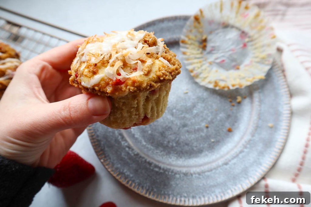 Strawberry Coconut Muffins with Crunchy Streusel Topping 7 Muffin on plate