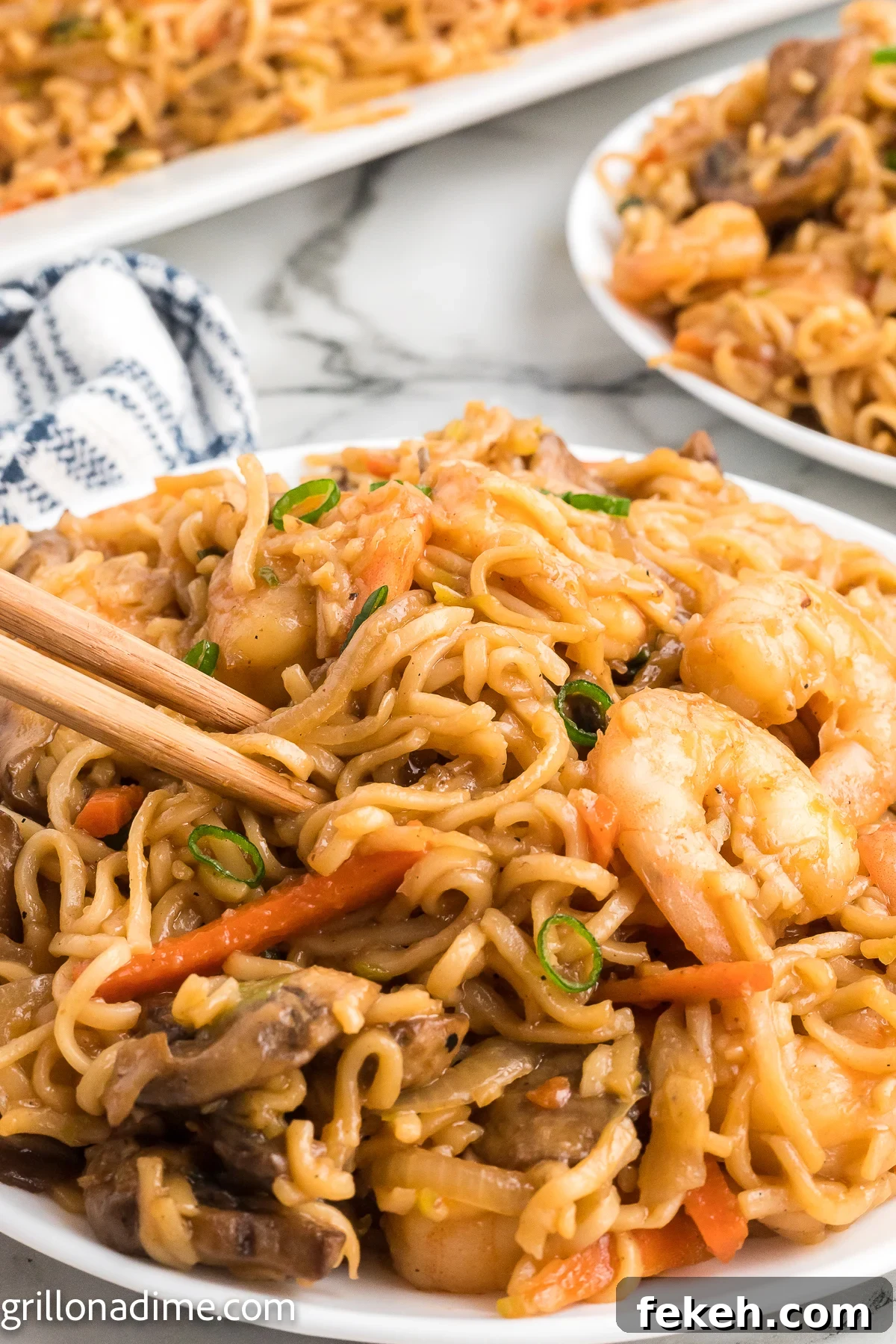Blackstone Shrimp Yakisoba Recipe — Quick Griddle Noodle Stir-Fry 9 Shrimp Yakisoba on a plate with chopsticks