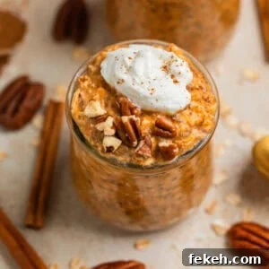 Pumpkin Pie Overnight Oats Recipe for Quick Fall Breakfast 5 Pumpkin pie overnight oats in jar topped with whipped cream and cinnamon and pecans.