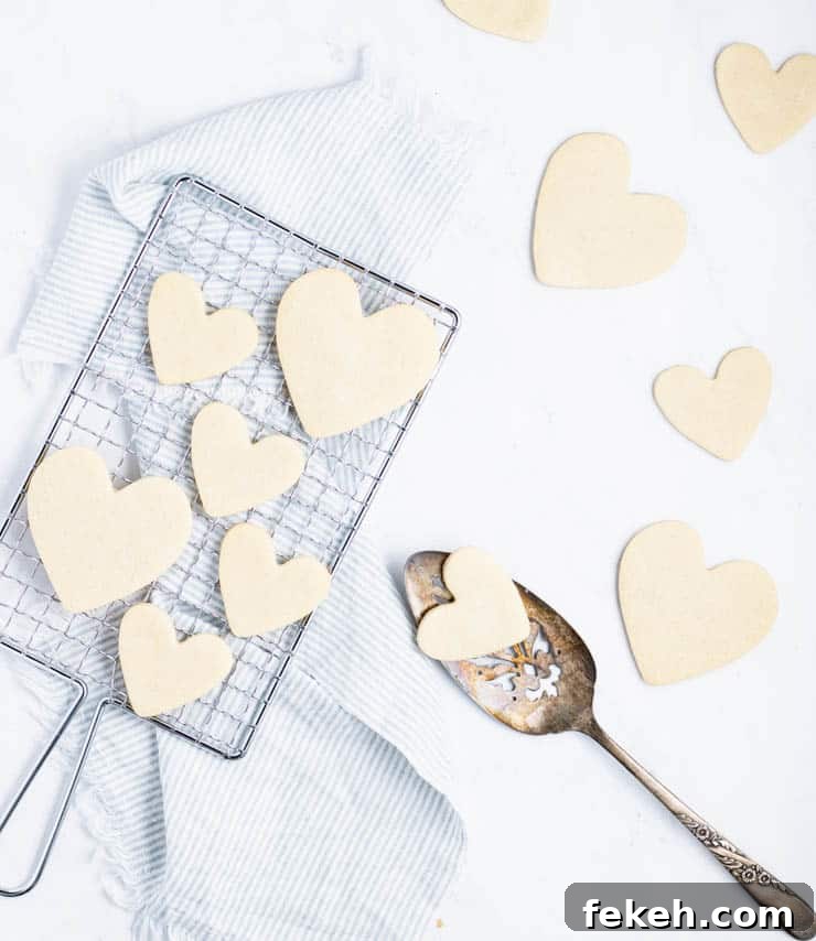 Heart-Shaped Sugar Cookies: Soft, Buttery Recipe for Any Occasion 3 overhead view of heart cookies on a cooling rack