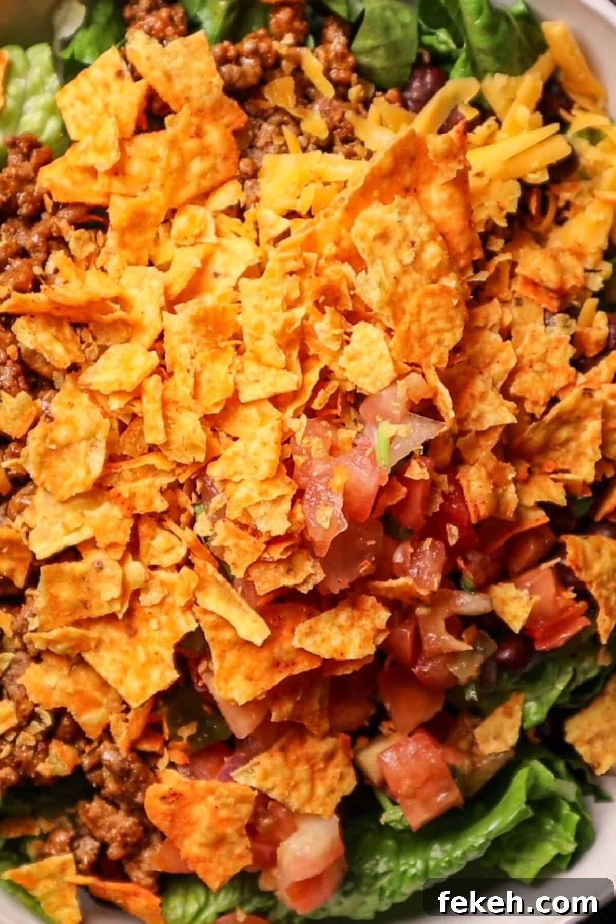 Doritos Taco Salad Recipe: Crunchy Layered Taco Salad with Doritos 6 taco salad topped with doritos
