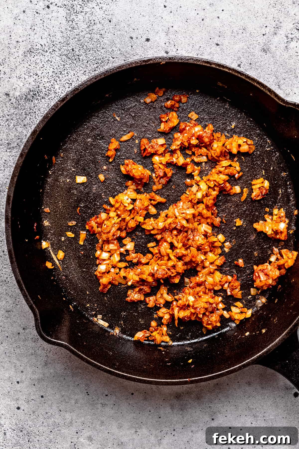 Sauteed onions with tomato paste.