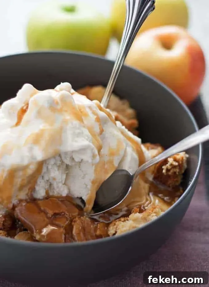 Apple Cake à la Mode: Warm Spiced Apple Cake with Vanilla Ice Cream 6 Apple Cake Sundae - hot apple cake fresh out of the oven, vanilla ice cream and caramel! My new favorite fall dessert!