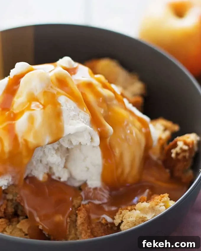 Apple Cake à la Mode: Warm Spiced Apple Cake with Vanilla Ice Cream 4 This apple cake sundae is a fun and easy fall dessert. Hot apple cake is topped with creamy vanilla ice cream and drizzles of caramel!