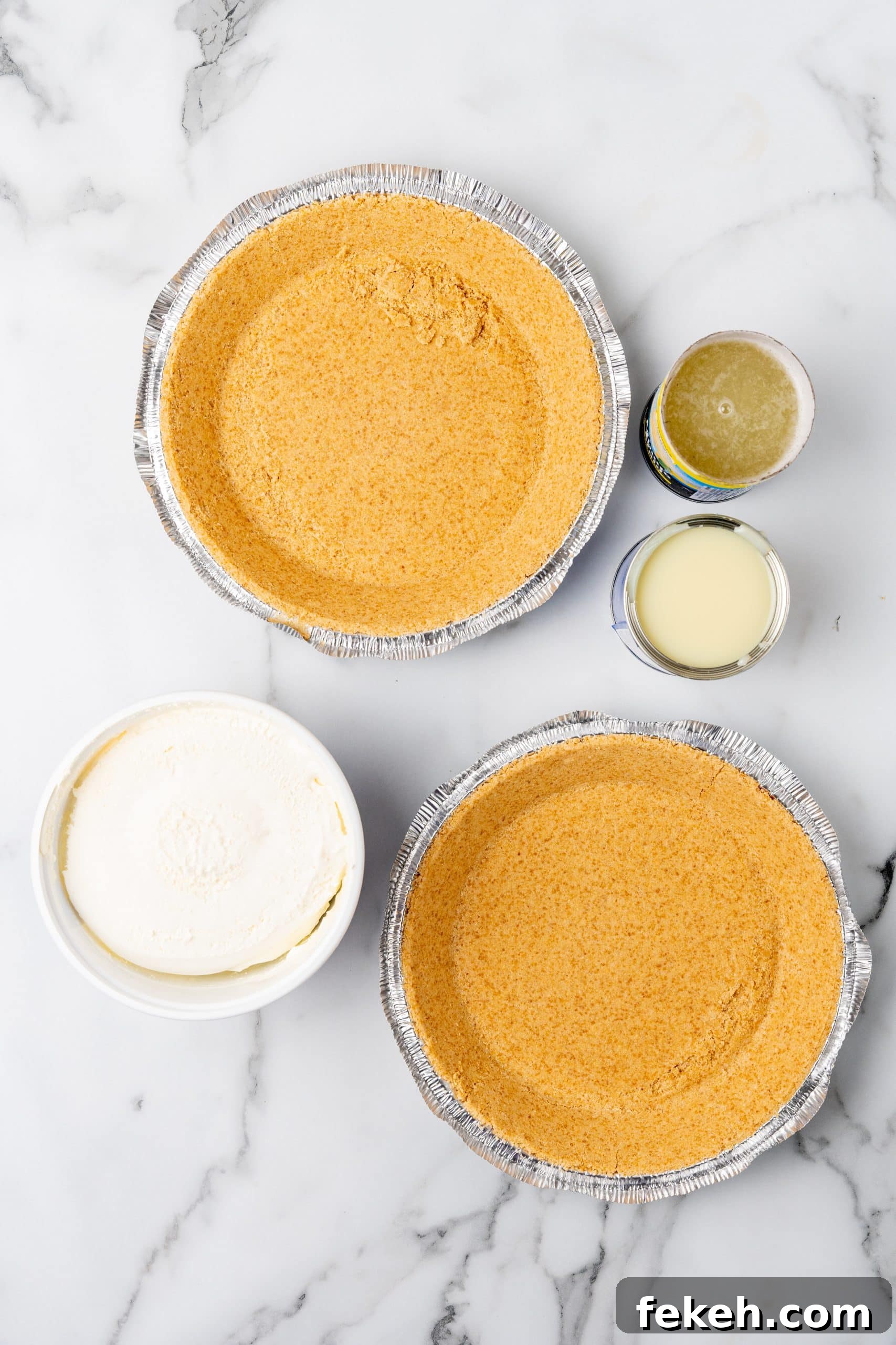 No-Bake Lemonade Cream Pie Recipe: Refreshing Summer Dessert 4 overhead image showing the measured ingredients needed to make a no bake lemonade pie