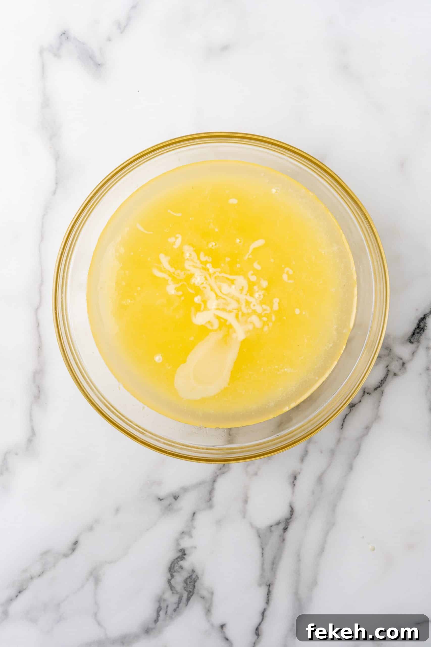No-Bake Lemonade Cream Pie Recipe: Refreshing Summer Dessert 5 lemonade concentrate in a glass mixing bowl