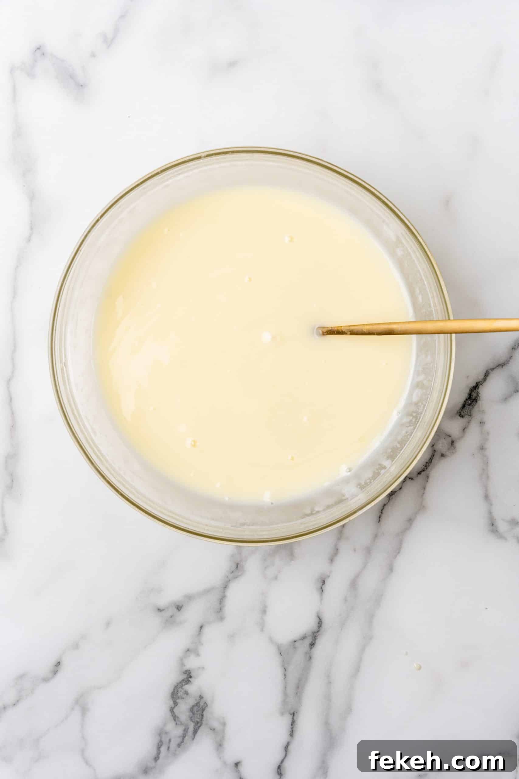 No-Bake Lemonade Cream Pie Recipe: Refreshing Summer Dessert 6 creamy lemonade mixture in a glass mixing bowl