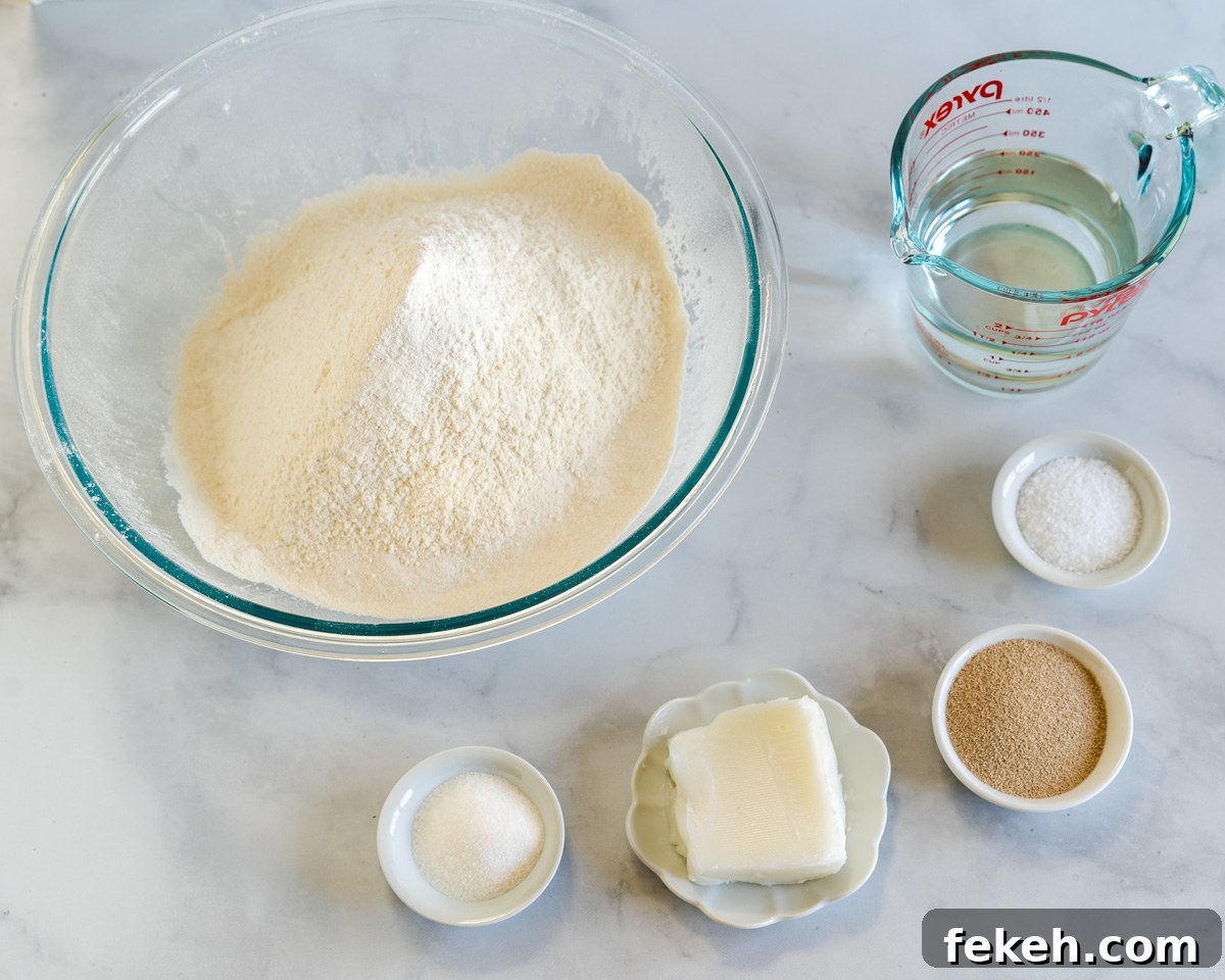 Authentic Cuban Bread (Pan Cubano) Recipe for Crispy Loaf 4 Cuban Bread Ingredients: Flour, yeast, sugar, lard, and salt.