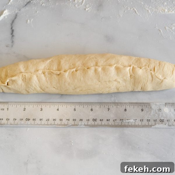 Authentic Cuban Bread (Pan Cubano) Recipe for Crispy Loaf 9 Bread dough shaped into a baguette 12 inches long - Hostess At Heart