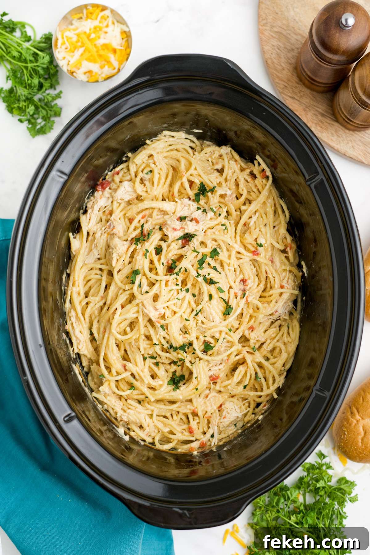 Chicken spaghetti in the slow cooker ready to serve.