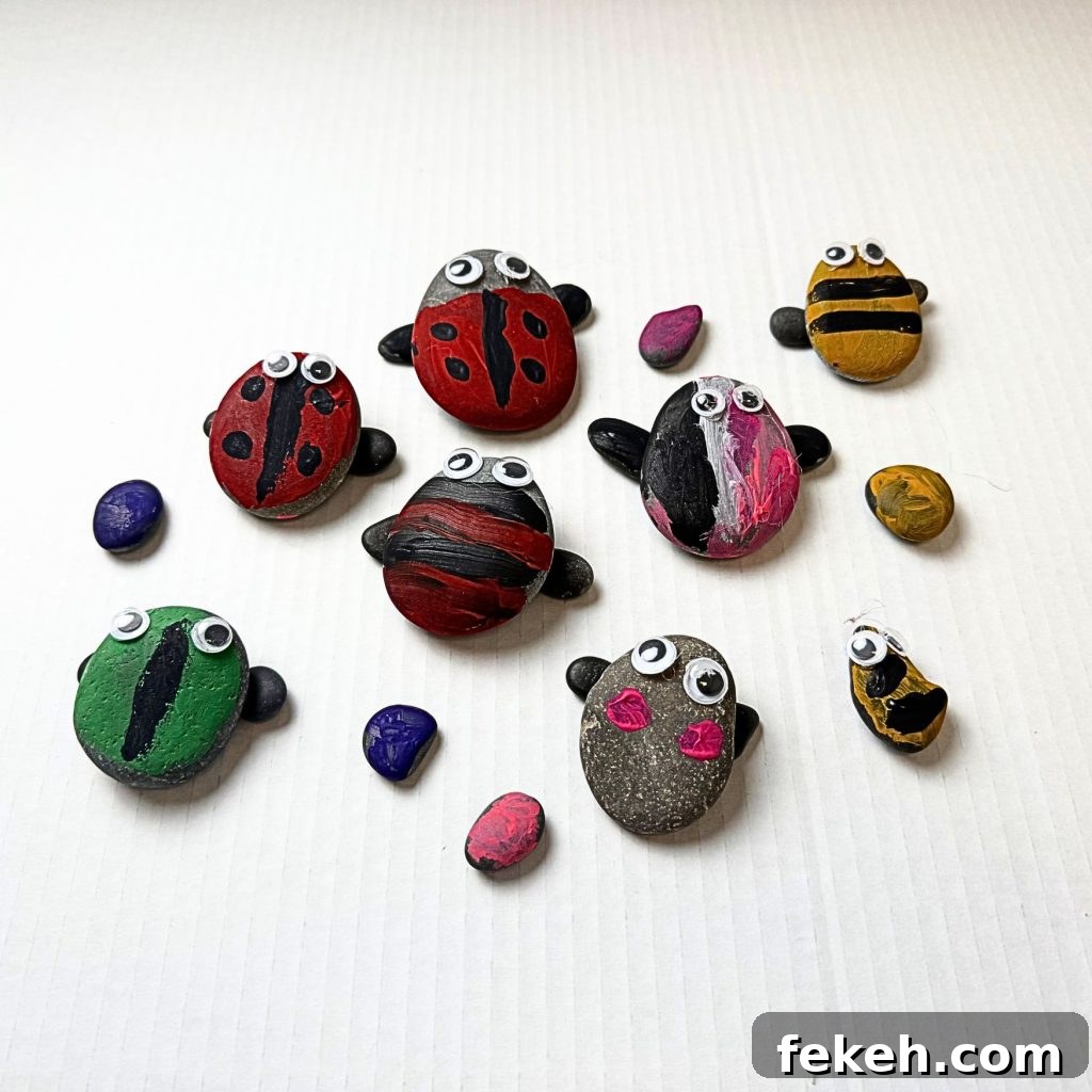 Create a Rocky Bug Garden: DIY Guide for Backyard Insects 2 Painted rock bugs on display