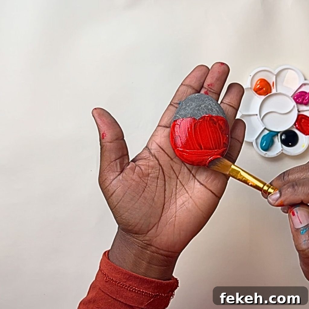 Create a Rocky Bug Garden: DIY Guide for Backyard Insects 4 Painted ladybug rock