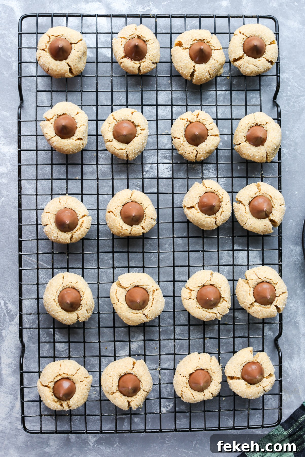 gluten free peanut butter blossoms on a wire rack