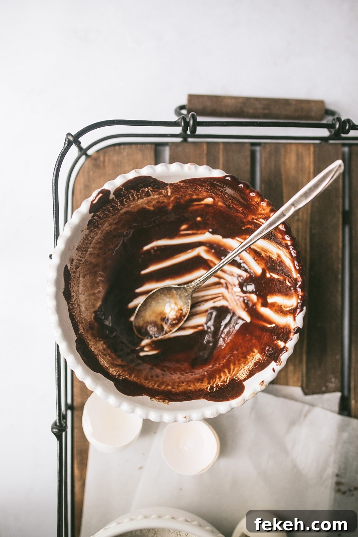 bottom of bowl with melted chocolate scraped off the bottom