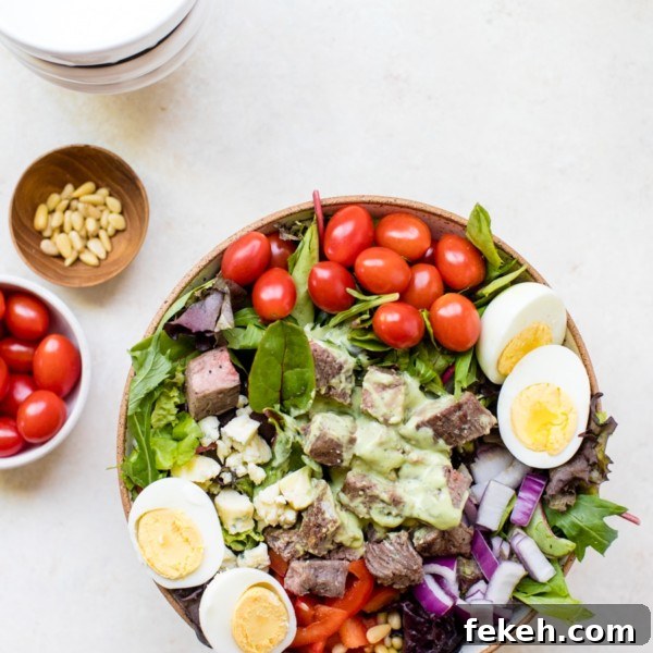 steak cobb salad on a white board
