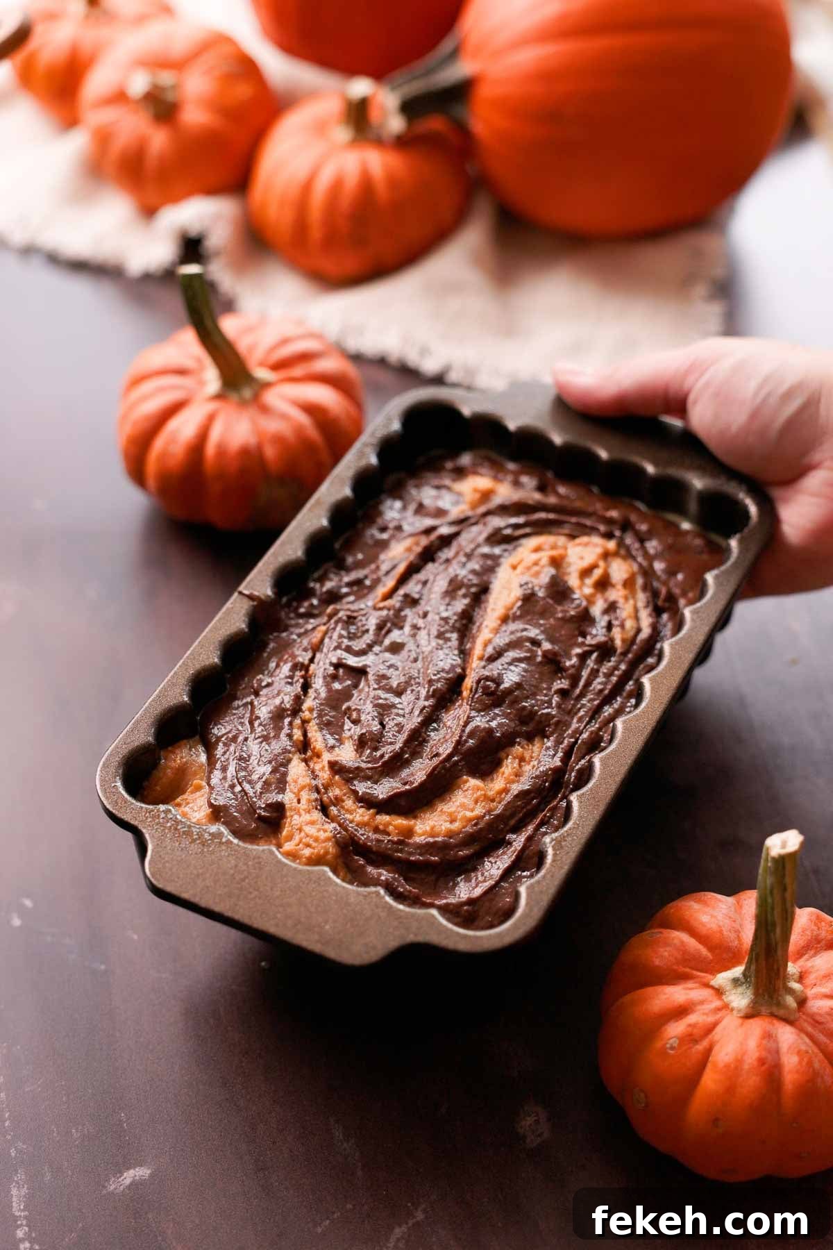 Pumpkin Chocolate Loaf with Spiced Chocolate Chips 11 chocolate and pumpkin bread batter in loaf pan
