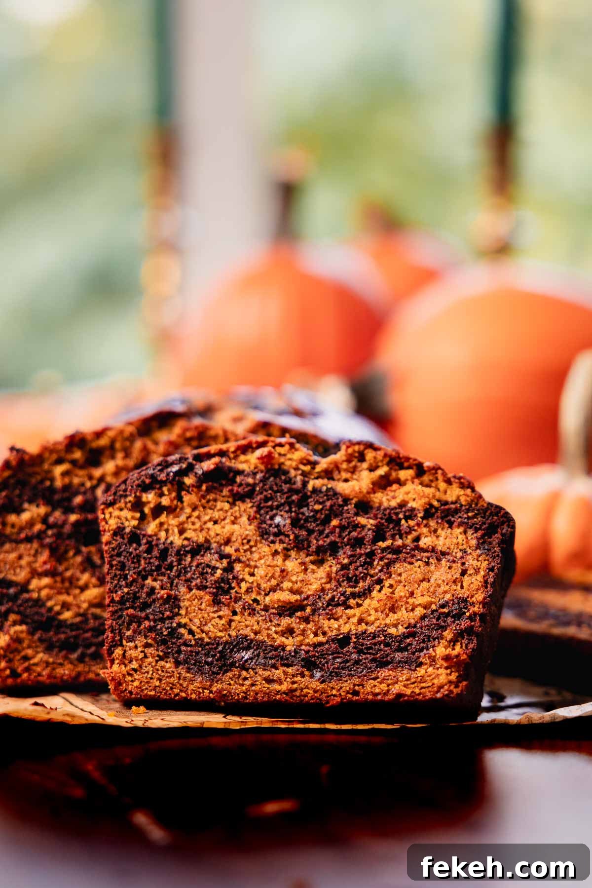 Pumpkin Chocolate Loaf with Spiced Chocolate Chips 13 slice of pumpkin bread swirled with chocolate and chocolate chips