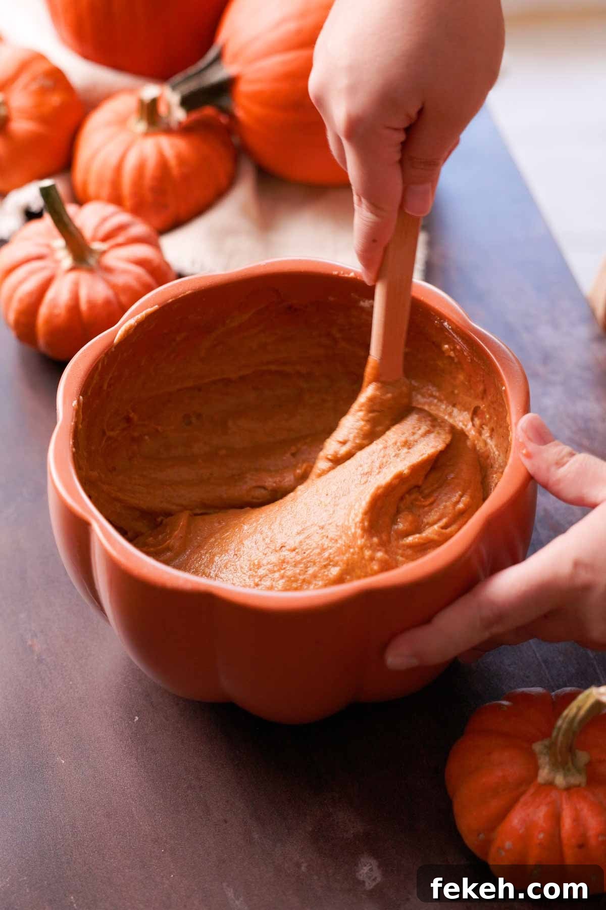 Pumpkin Chocolate Loaf with Spiced Chocolate Chips 7 stirring pumpkin bread batter with silicone spatula