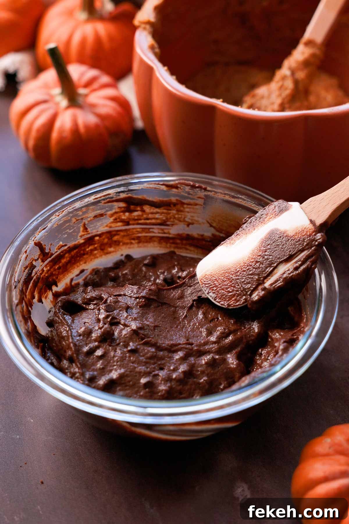 Pumpkin Chocolate Loaf with Spiced Chocolate Chips 9 folding mini chocolate chips into chocolate pumpkin bread batter