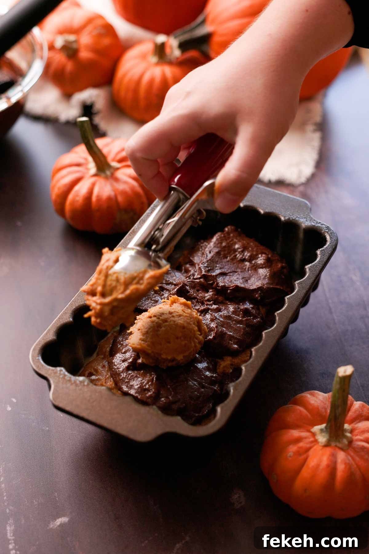 Pumpkin Chocolate Loaf with Spiced Chocolate Chips 10 layering pumpkin and chocolate batter in loaf pan