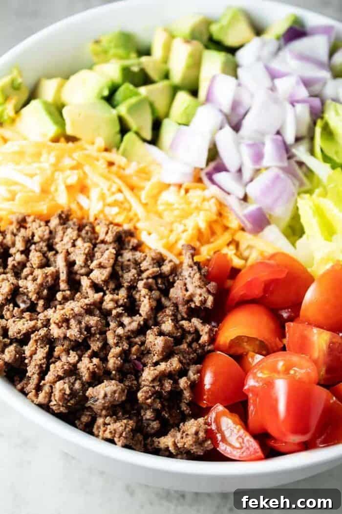 Low-Carb Keto Taco Salad Recipe for Quick Weeknight Meals 12 closeup of large white bowl of keto taco salad