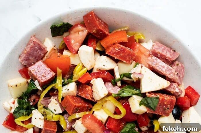 Low-Carb Keto Taco Salad Recipe for Quick Weeknight Meals 16 closeup of keto anitpasto salad served in a salad bowl