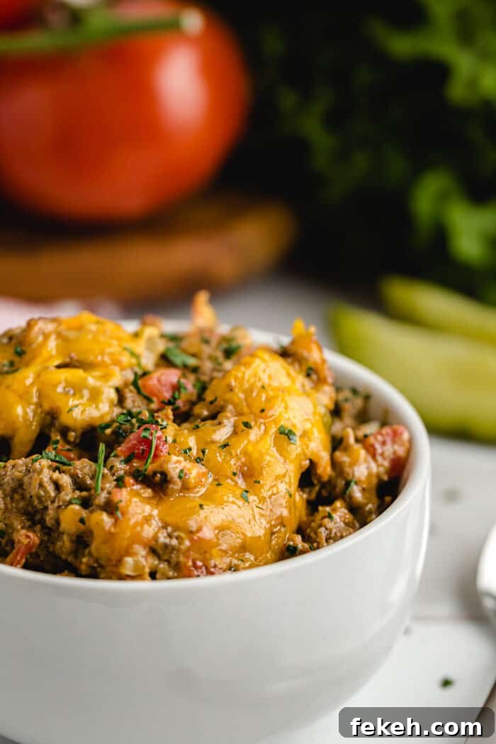 Low-Carb Keto Taco Salad Recipe for Quick Weeknight Meals 24 keto cheeseburger casserole in serving bowl
