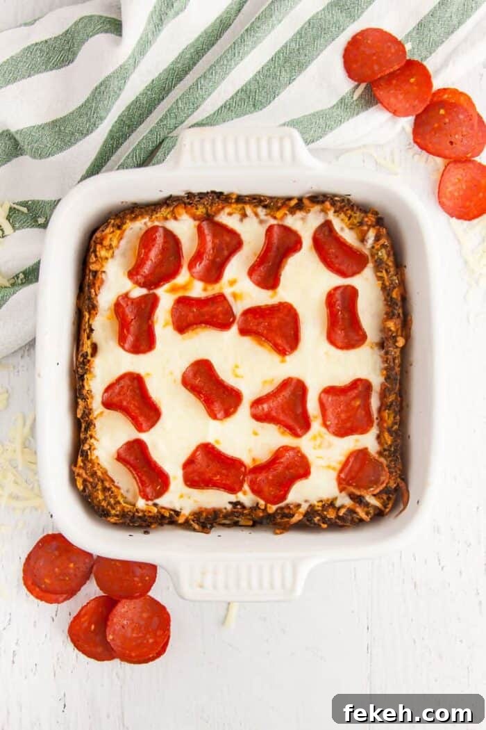 Low-Carb Keto Taco Salad Recipe for Quick Weeknight Meals 25 keto low carb pizza casserole in serving dish with pepperoni and cheese
