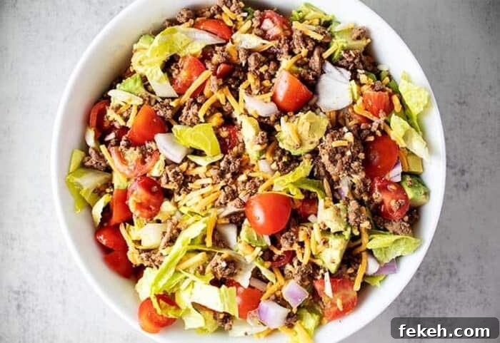 Low-Carb Keto Taco Salad Recipe for Quick Weeknight Meals 4 overhead view of taco salad mixed together in a white bowl