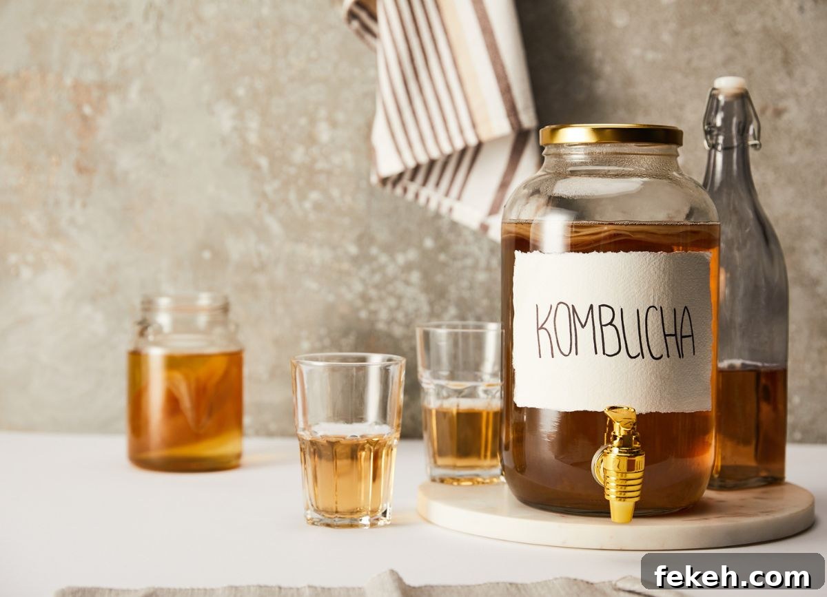 Is Kombucha Gluten-Free? What You Need to Know About Gluten in Kombucha 2 A few glasses and a jar of kombucha.
