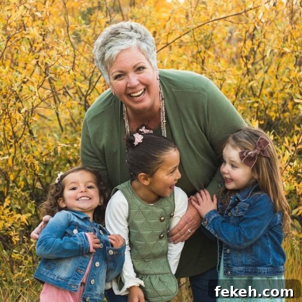 Celebrating My 5-Year Blogiversary: Highlights & Milestones 6 Norine with her granddaughters in a grove of Fall colored trees.