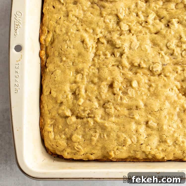 Peanut Butter Banana Oat Oatmeal Bars — Chewy Snack Squares 9 baking pan with oatmeal bars