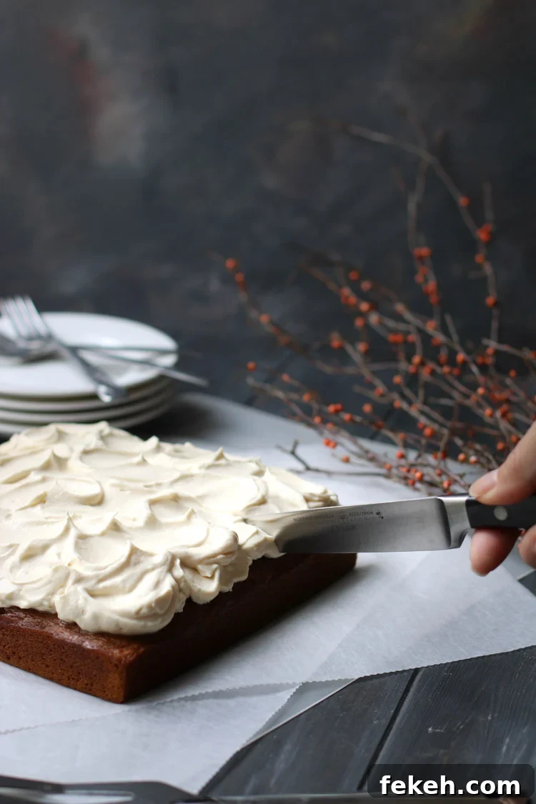 Pumpkin Olive Oil Cake — Eggless, Dairy-Free, Butter-Free Recipe 3 A knife cutting into a crazy pumpkin olive oil cake