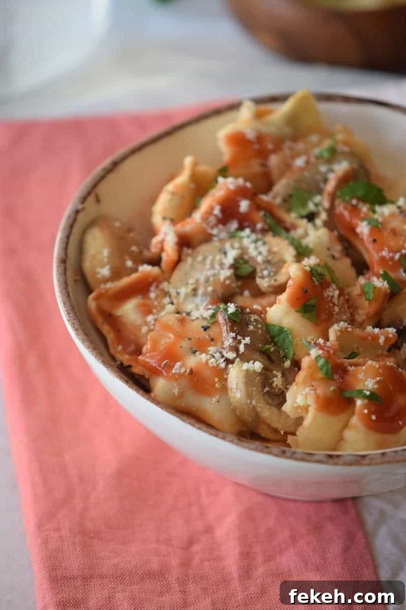 Bowl of ravioli with mushroom sauce.