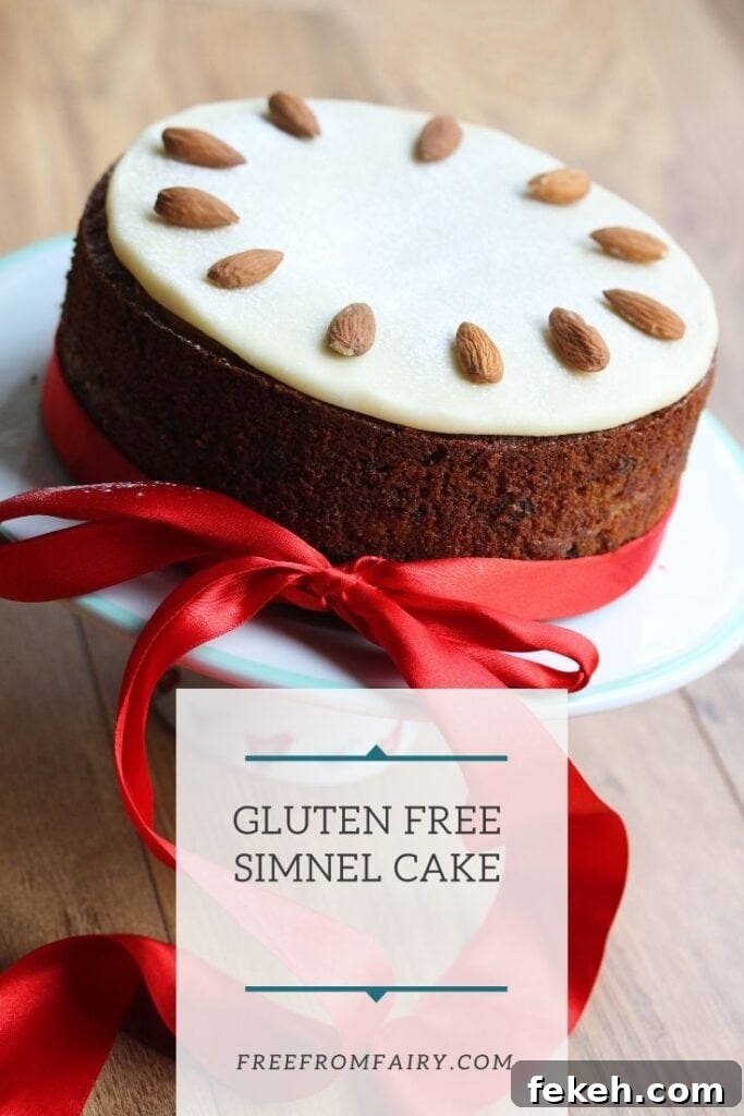Gluten-Free Fruit Cake with Simnel Cake Option 9 Gluten free simnel cake. A rich, moist gluten free fruit cake with marzipan baked in the middle and a marzipan disk on the top. #glutenfreeeaster #glutenfreeeasterrecipe #glutenfreesimnelcake #freefromfairy