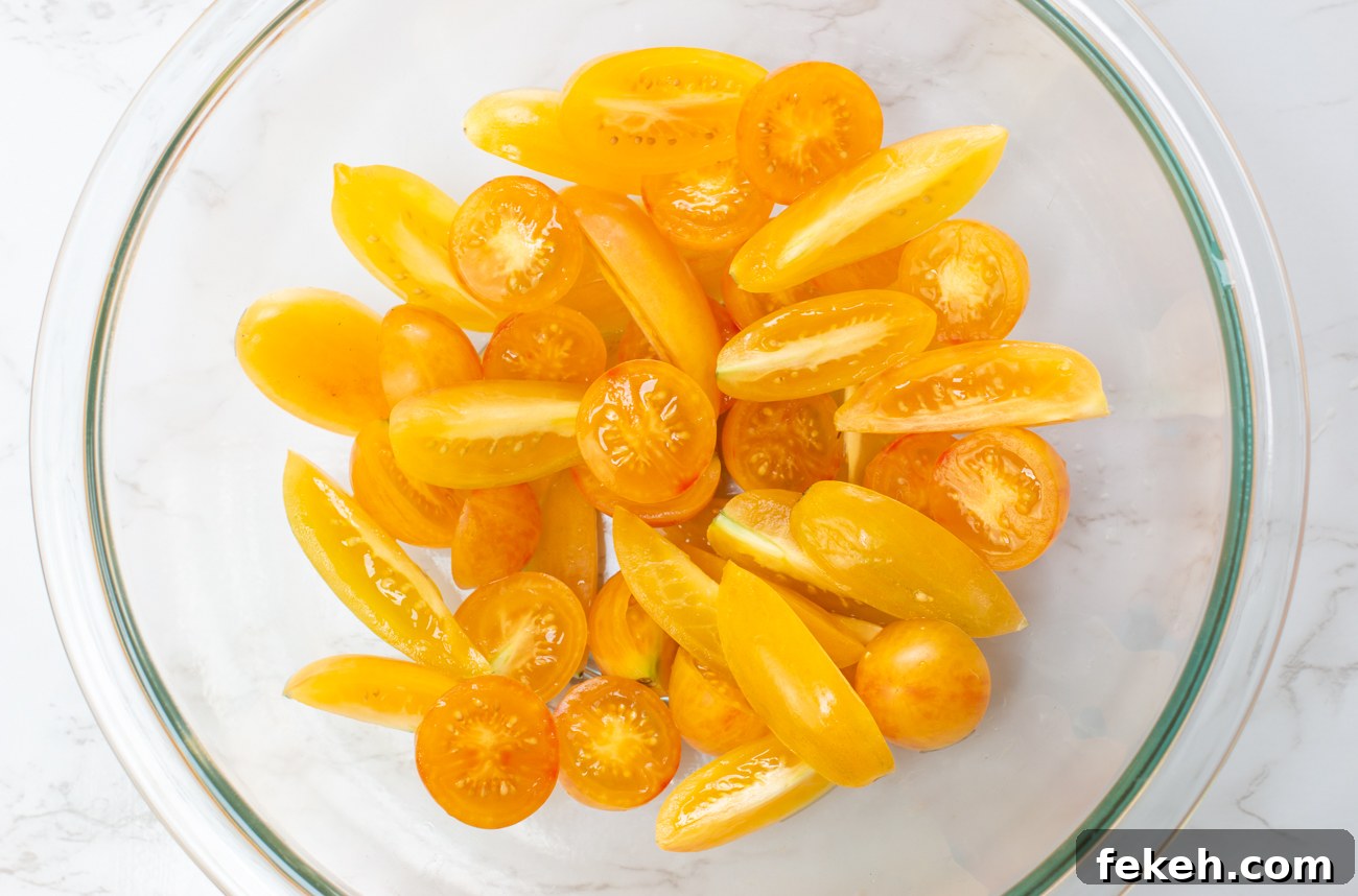 Fresh No-Cook Heirloom Yellow Tomato Sauce with Pasta Recipe 9 Heirloom Tomatoes cut in half - the start of the No-Cook Tomato Sauce