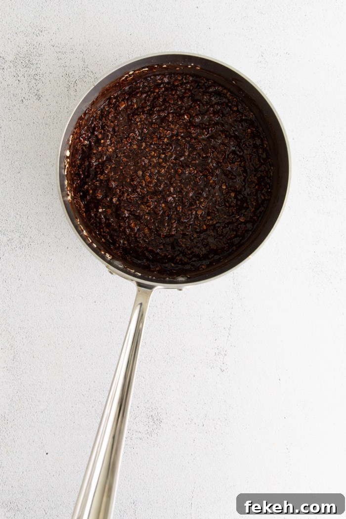 No-Bake Vegan Cookies: Quick Chocolate Oat Treats 6 chocolate and oat mixture in a saucepan