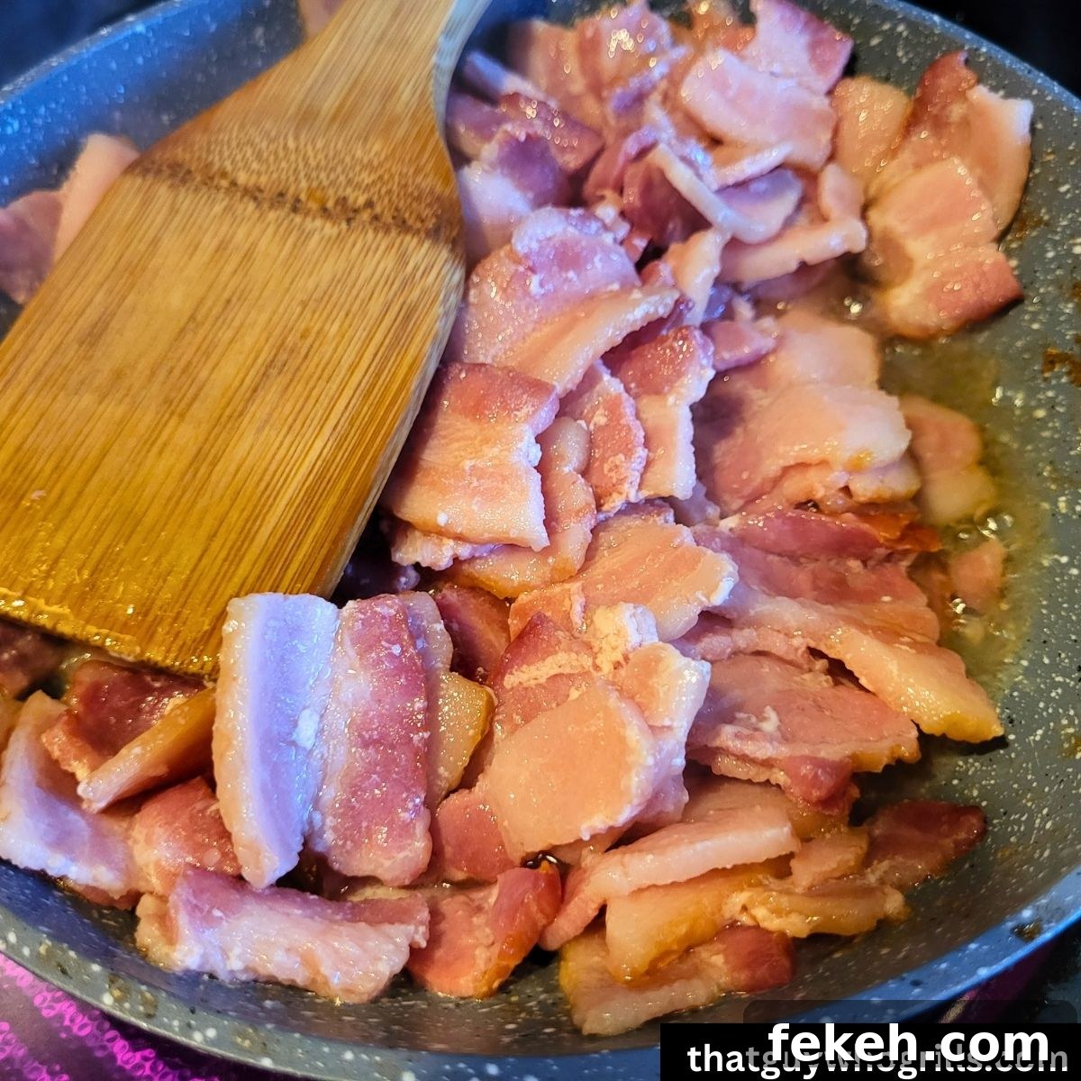 Creamy Smoked Salmon Chowder Recipe for Cozy Weeknight Dinners 3 bacon sauting in a fry pan for salmon chowder