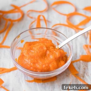 Carrot Purée: Homemade Baby Food & Versatile Side Dish 9 carrot puree in a small glass dish