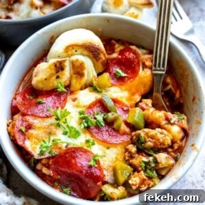 Creative Pizza Bowl Recipes: Flavorful Mini Pizza Bowls for Any Meal 12 White bowl with ground meat and pepperoni.