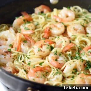 Orange-Balsamic Shrimp Pasta with Garlic and Parmesan 5 Orange-Balsamic Shrimp Pasta - sautéed shrimp are coated in a spicy and tangy citrus sauce that is out of this world!