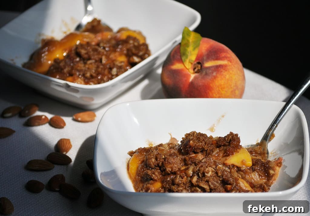 Perfect Peach Crisp Recipe with Oat Streusel Topping 3 Fresh Peach Crisp Recipe. Fresh peaches topped with a buttery brown almond streusel. | OfBatterAndDough.com