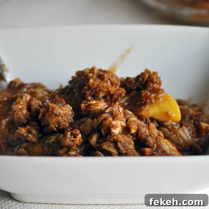 Fresh Peach Crisp Recipe. Fresh peaches topped with a buttery brown almond streusel. | OfBatterAndDough.com