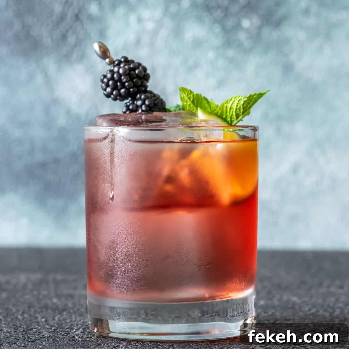 22 Elegant Cocktail Recipes for Sophisticated Events 11 Blackberry whiskey smash with berries and mint leaf.