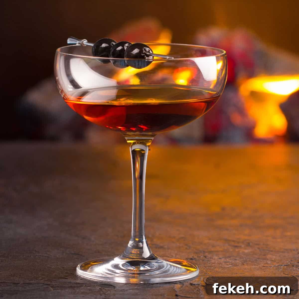 22 Elegant Cocktail Recipes for Sophisticated Events 10 Manhattan cocktail on table.