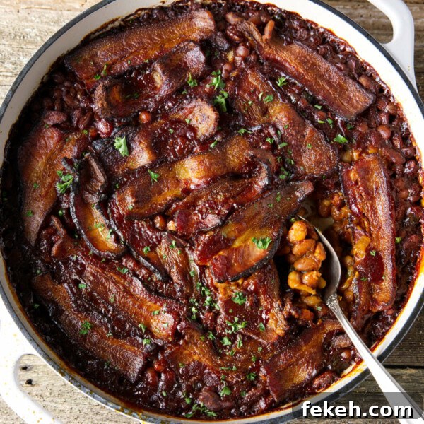 Smoked Pork Butt (Smoked Pork Shoulder) Recipe for Tender, Juicy Meat 20 smoked baked beans in dutch oven with bacon laid on top