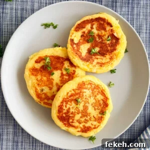 Crispy Mashed Potato Cakes (Potato Patties) Recipe 7 leftover mashed potato cakes (potato patties) on a plate with parsley